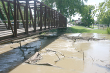 It took MDOT crews several hours Sunday working into the night to break the logjam in the River Raisin. Copyright 2015, River Raisin Publications, Inc.
